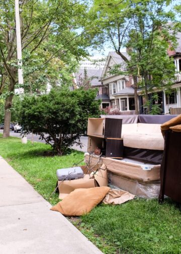 Old furniture left on the pavement for collection outside residential homes