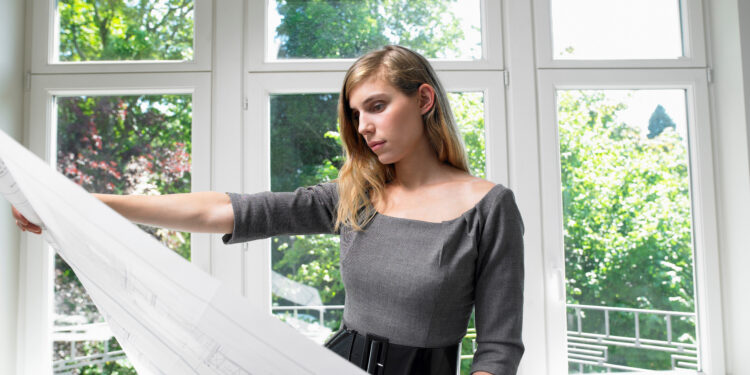 Newly installed white uPVC double-glazed windows on a residential UK home exterior