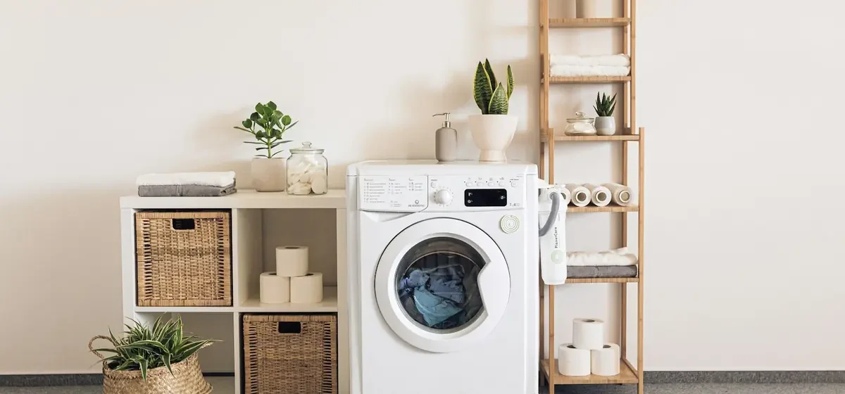 Washer and dryer in a bright utility room